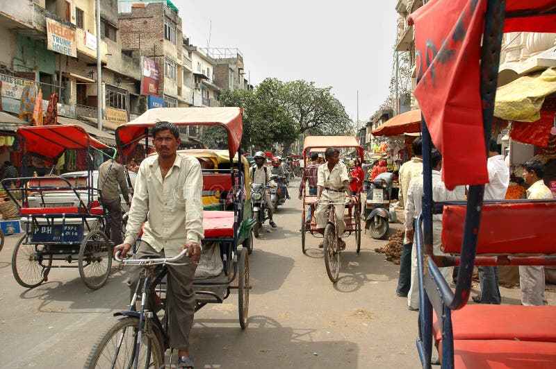 A tricycle rickshaws on the streets Delhi stock photos A tricycle rickshaws on the streets Delhi stock photos