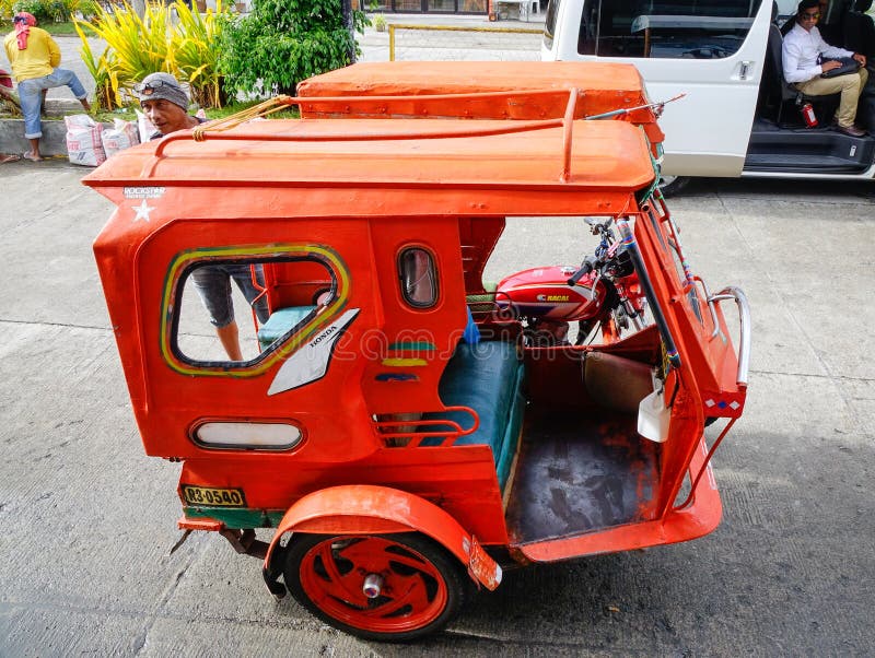 Tricycle sur la rue à Boracay, Philippines image stock Tricycle sur la rue à Boracay, Philippines image stock