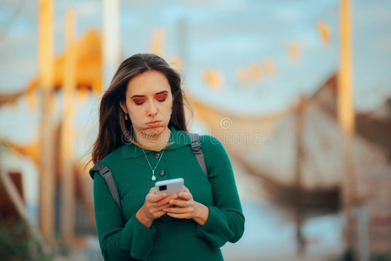 Disoriented tourist wondering on a beach by herself. Disoriented tourist wondering on a beach by herself