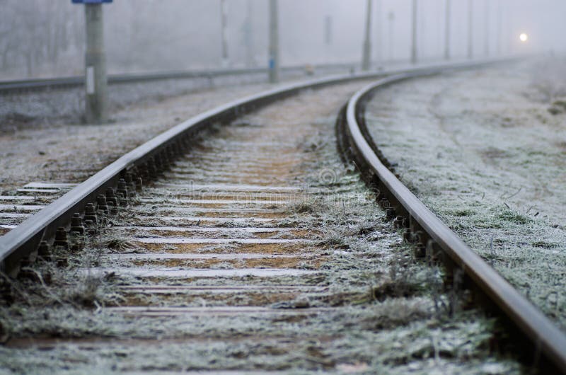 Railroad tracks, frosted. Frosty foggy day. Tracks lead straight. Railroad tracks, frosted. Frosty foggy day. Tracks lead straight.