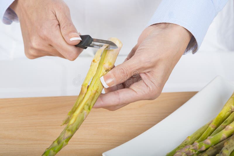 Trim and peel asparagus stock photo. Image of stems, cultivated 64438380
