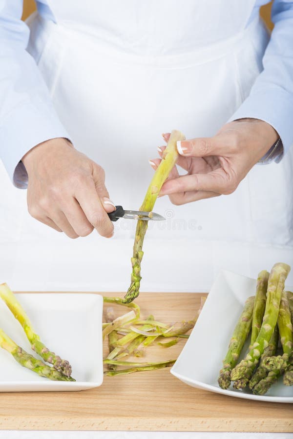 Trim and peel asparagus stock image. Image of spears 64438505