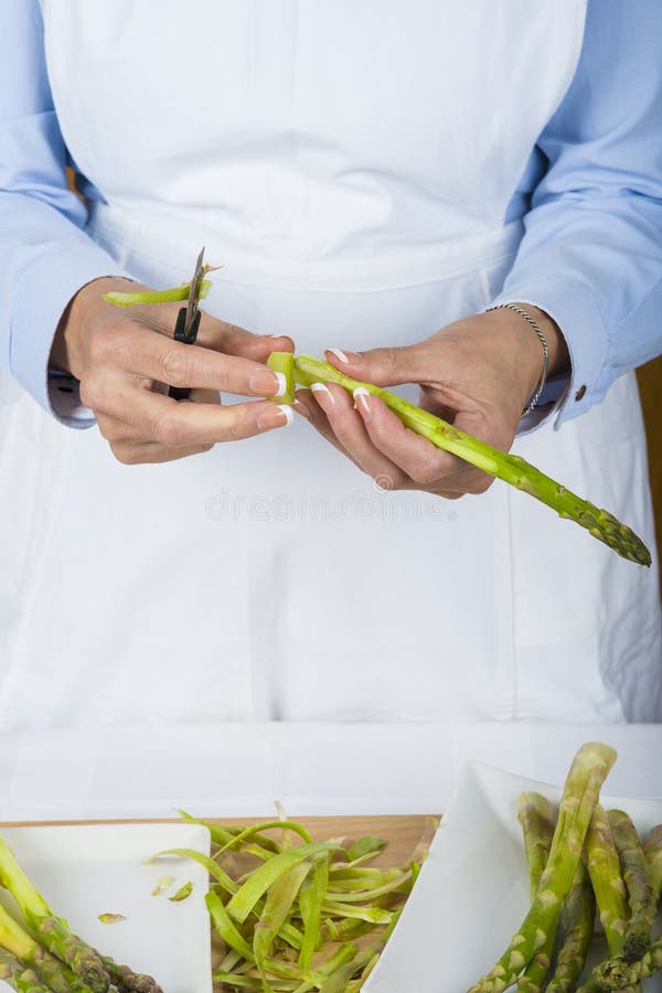 Trim and peel asparagus stock photo. Image of spears 64439038