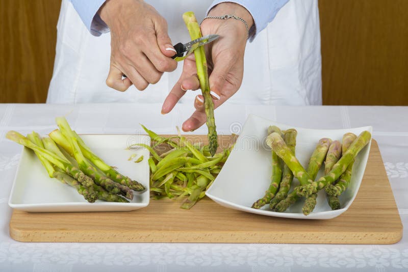 Trim and peel asparagus stock photo. Image of natural 64439278