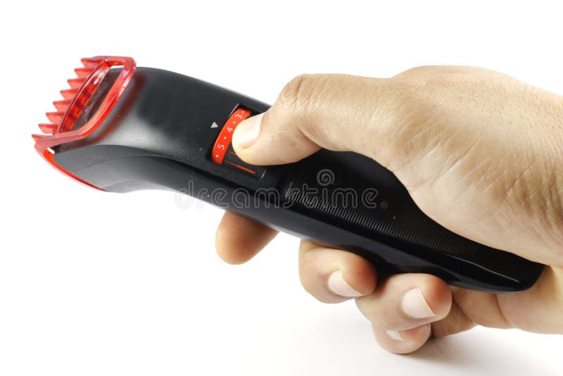 A trimmer held in hand. stock photo. Image of tool, shaving 99774212
