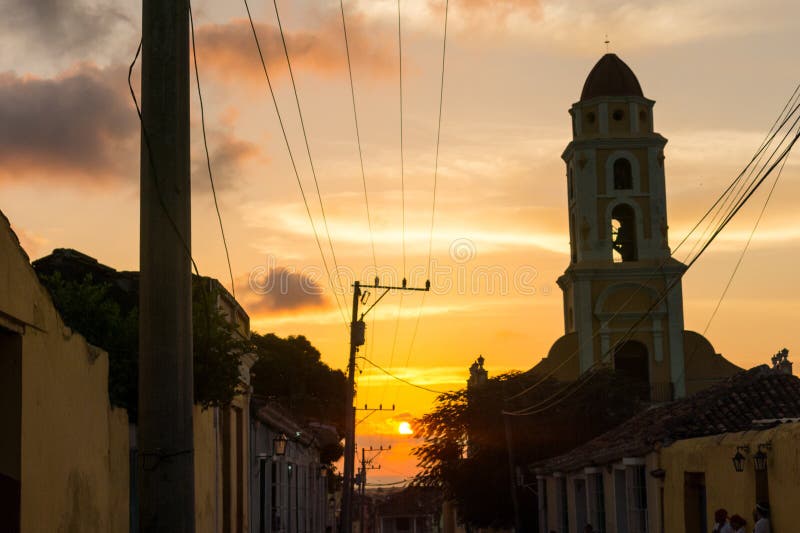 Cuban street sunset with oldtimer in Trinidad, Cuba royalty free stock images Cuban street sunset with oldtimer in Trinidad, Cuba royalty free stock images