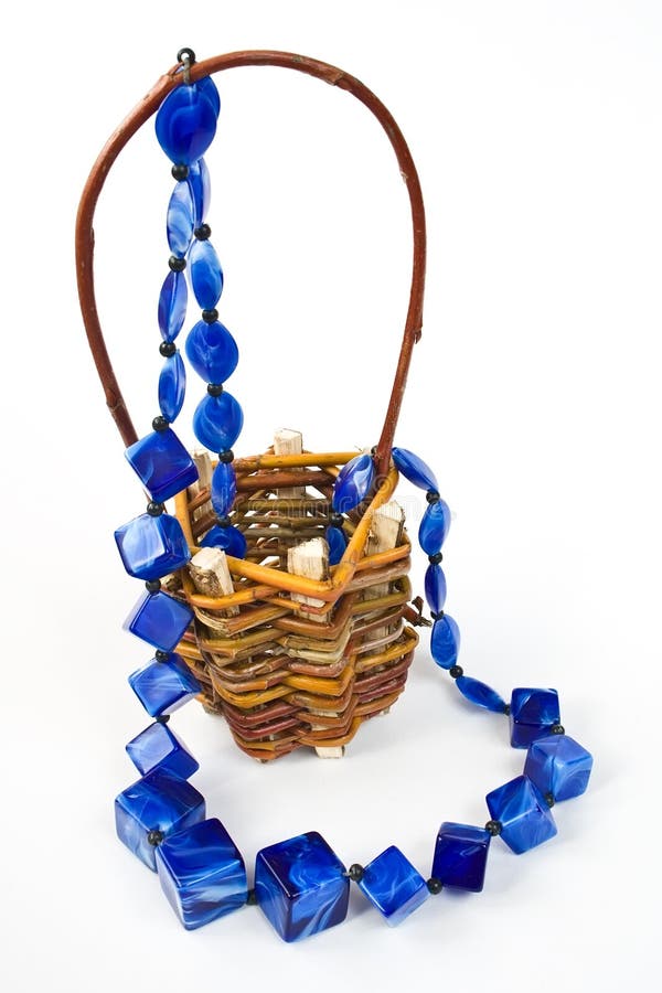 Handmade blue trinkets in basket - cube shaped. Handmade blue trinkets in basket - cube shaped