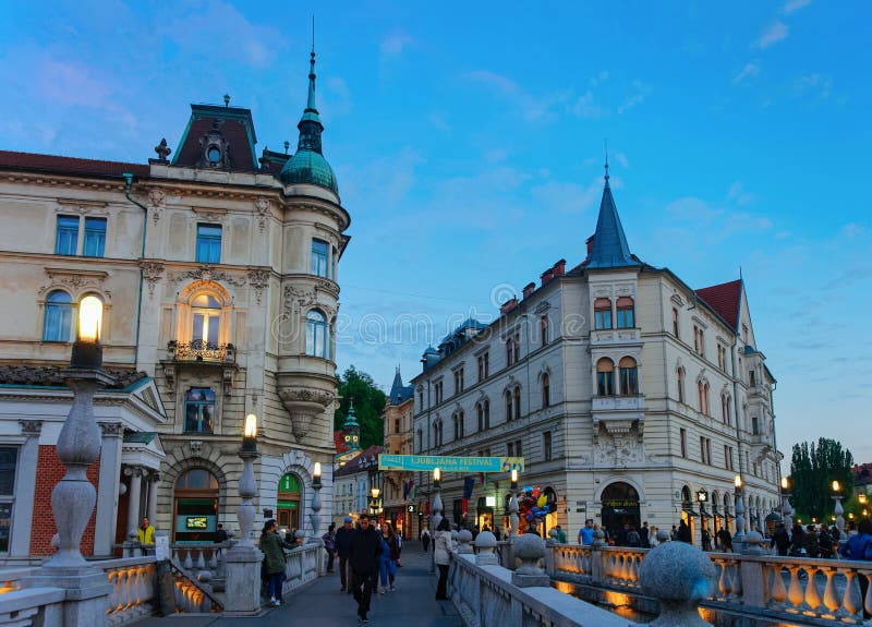 Triple bridge and Ljubljanica River at Ljubljana Slovenia evening royalty free stock photos Triple bridge and Ljubljanica River at Ljubljana Slovenia evening royalty free stock photos