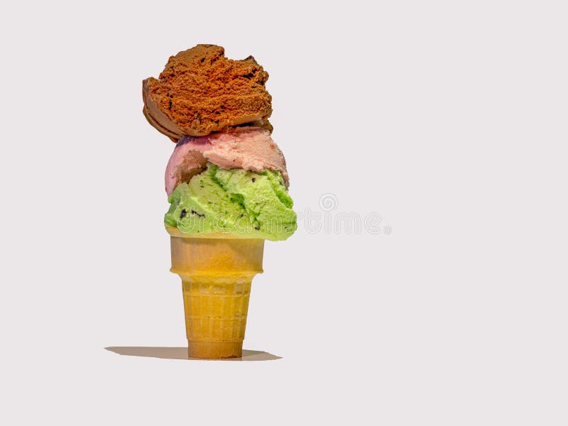 Triple Scoop Ice Cream cone on white. royalty free stock photo