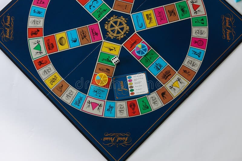 Trivial Pursuit game pieces which is a board game