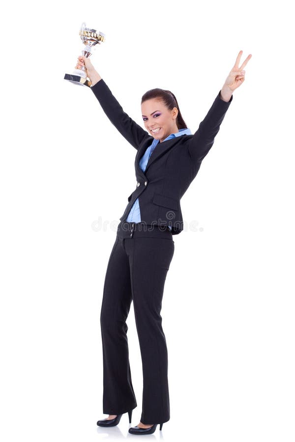 Troféu de vencimento atrativo da mulher de negócio foto de stock royalty free Troféu de vencimento atrativo da mulher de negócio foto de stock royalty free