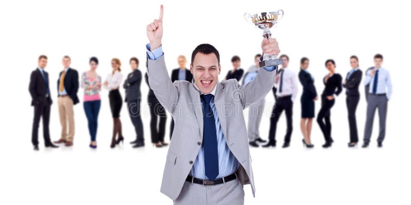 Troféu de vencimento da terra arrendada do líder do businessteam foto de stock Troféu de vencimento da terra arrendada do líder do businessteam foto de stock