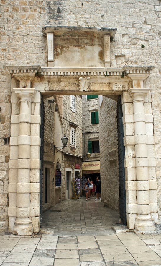 Trogir croatia 07252015 stone gate in the street of old town beautiful architecture day stock images