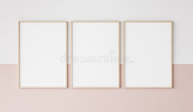 Trois cadres de bois sur la maquette de rose et blanche de mur de cadre
