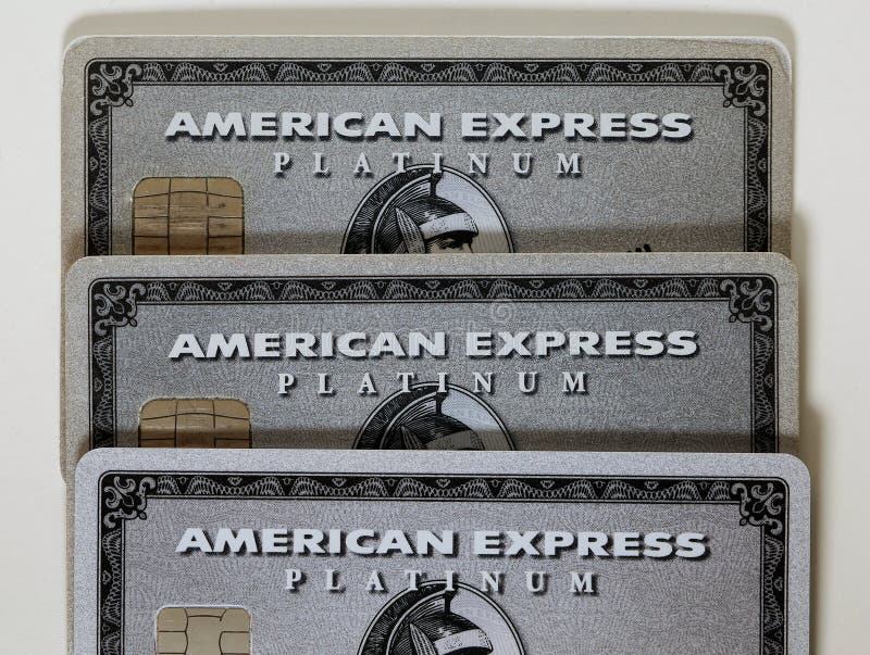 Three American Express Amex Platinum cards stacked on a white table. Symbols of wealthy, rich and luxurious lifestyle with a lot of benefits and travels. Photographed in Espoo, Finland May 2019. Three American Express Amex Platinum cards stacked on a white table. Symbols of wealthy, rich and luxurious lifestyle with a lot of benefits and travels. Photographed in Espoo, Finland May 2019.