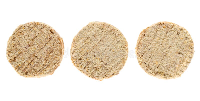 Trois côtelettes crues de viande d'isolement sur le fond blanc photographie stock Trois côtelettes crues de viande d'isolement sur le fond blanc photographie stock