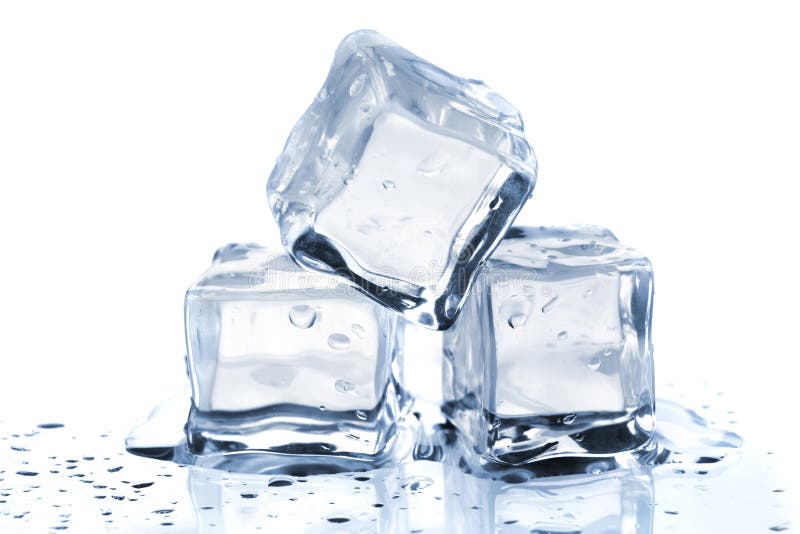 Three melting ice cubes on glass table. On white background. Three melting ice cubes on glass table. On white background