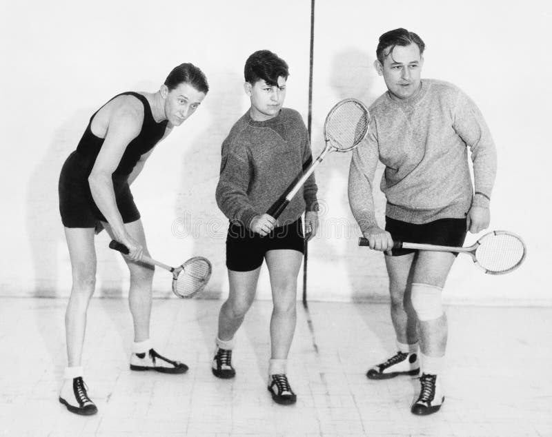 Trois hommes jouant la courge (toutes les personnes représentées ne sont pas plus long vivantes et aucun domaine n'existe Garanti photographie stock libre de droits Trois hommes jouant la courge (toutes les personnes représentées ne sont pas plus long vivantes et aucun domaine n'existe Garanti photographie stock libre de droits