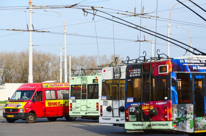 Trolley buses and taxis at final stop, Gomel, Belarus stock images Trolley buses and taxis at final stop, Gomel, Belarus stock images