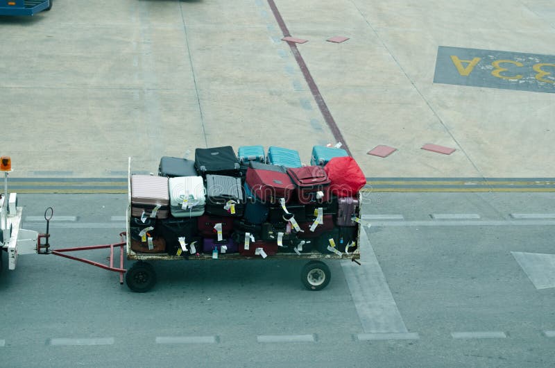 A Trolley Pulling Luggage at Airport Stock Image Image of airport