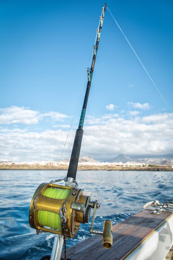 Trolling Fishing Boat Rod and Golden Saltwater Reel Deep Blue Ocean Sea  Wake. Dominican Republik Punta Cana Fishing Boat Stock Photo - Image of  cable, fresh: 164263686
