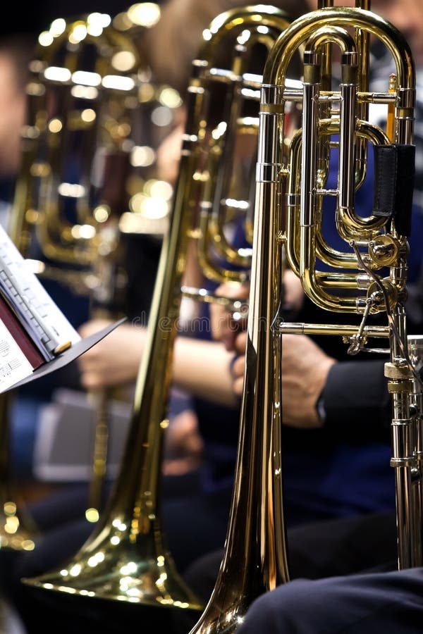 Trombones in the Hands of Musicians Stock Image - Image of music ...