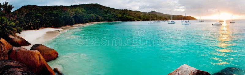 Panoramic view of a tropical beach at dawn. Anse Lazio, Praslin island, Seychelles, Indian Ocean. Seychelles stock images, royalty-free photos and pictures