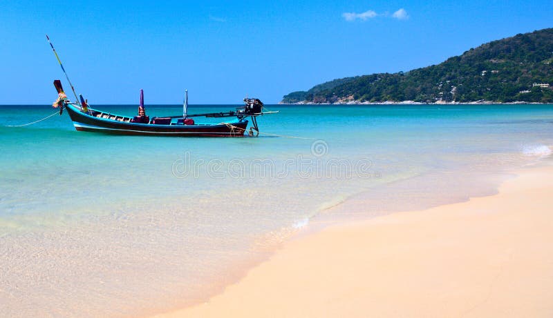 Tropical beach and the boat