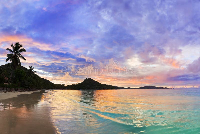 Tropical beach Cote d Or at sunset, Seychelles