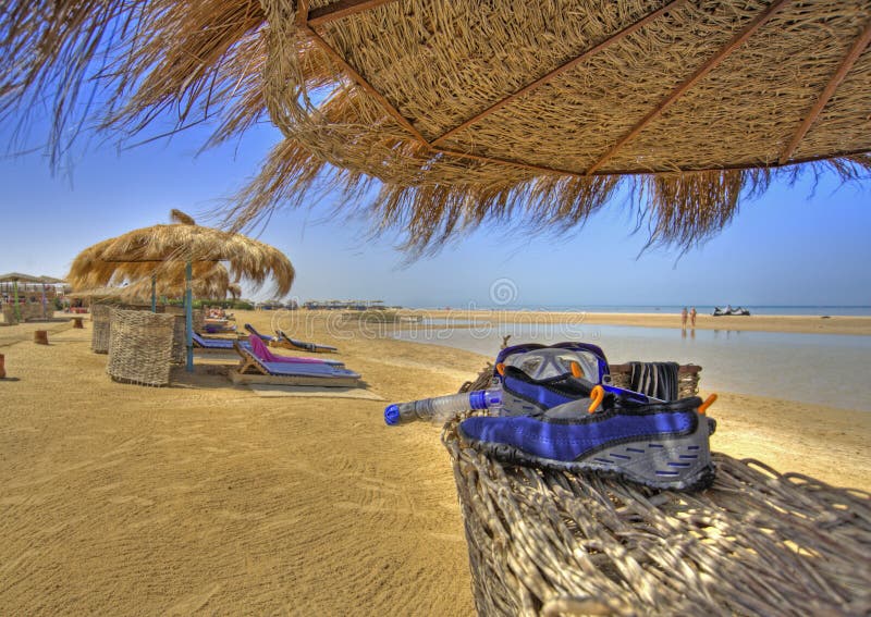 Tropical beach with snorleling gear