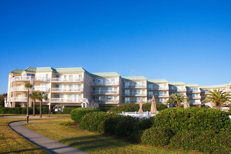 Tropical Condos Under Blue Sky