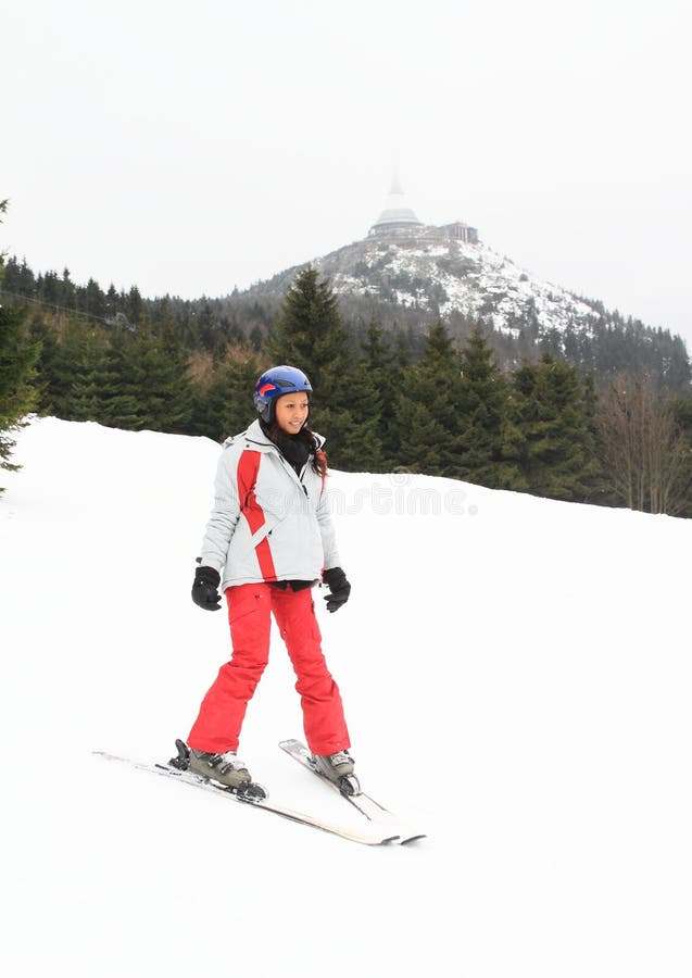 Tropical girl skiing