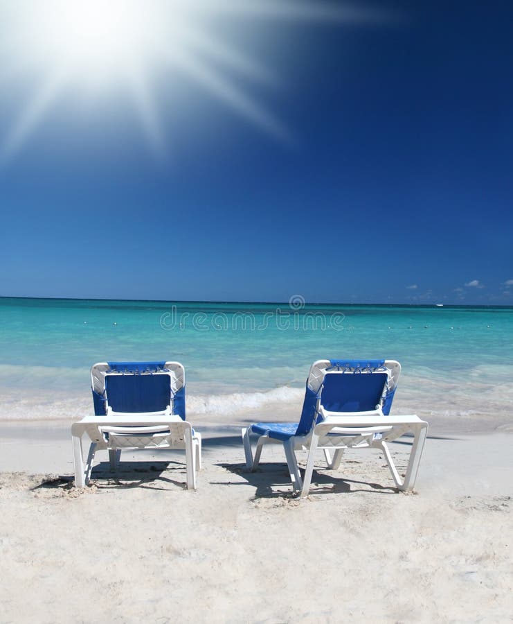 Tropical Paradise Lounge Chairs On Beach, Ocean Stock