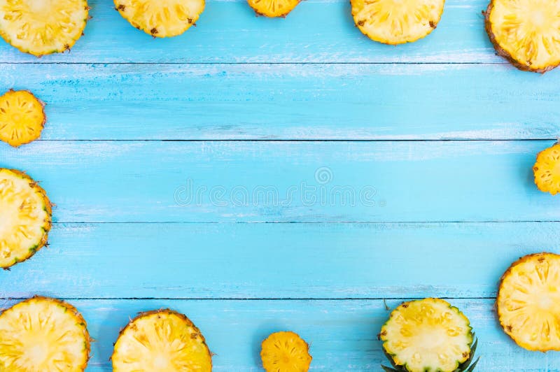 Tropical pineapple on wood plank blue color. stock photos Tropical pineapple on wood plank blue color. stock photos