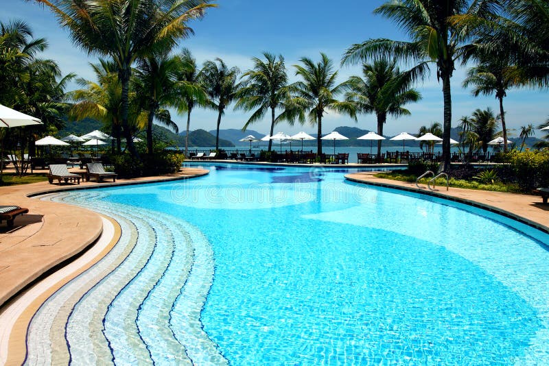 Beautiful tropical swimming pool at luxury resort. Beautiful tropical swimming pool at luxury resort