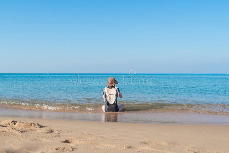 Tropical Sea Beach with Young Girl Relaxing on Sand Stock Photo - Image ...