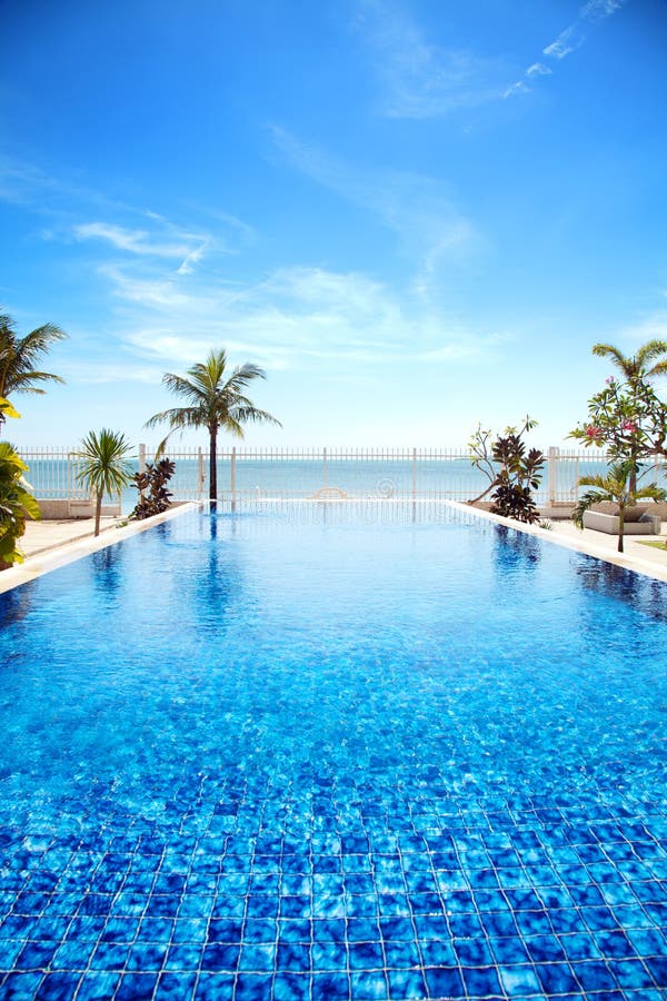 Tropical swimming pool royalty free stock photo