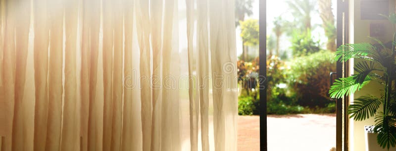 Tropical view background. Summer, travel, vacation and holiday concept. Open window, door and white curtain with blurred