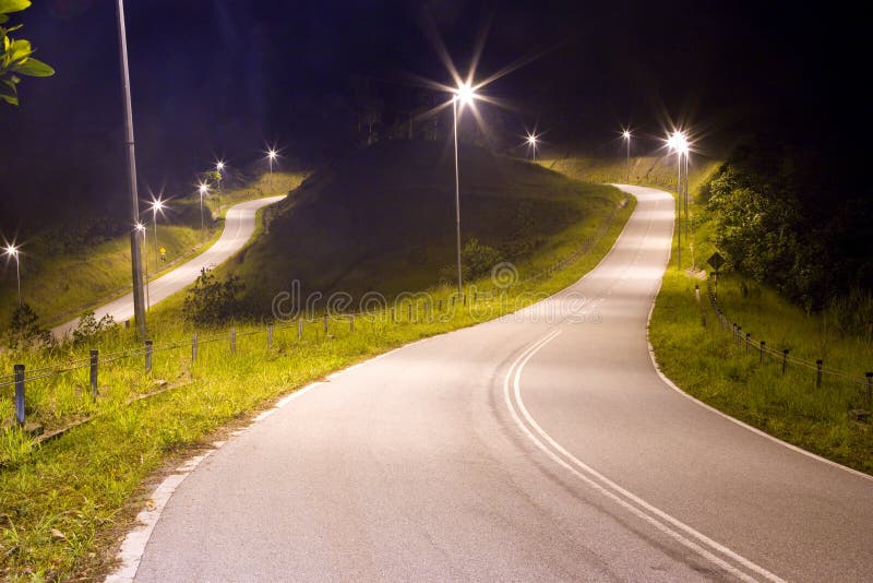 Image of a Malaysian country road at night. Image of a Malaysian country road at night.