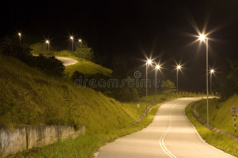 Image of a Malaysian country road at night. Image of a Malaysian country road at night.