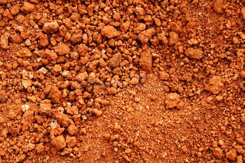 Tropical laterite soil or red earth background. Tropical laterite soil or red earth background.