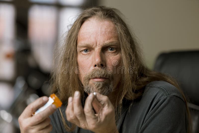 Man with an Opioid Pill
