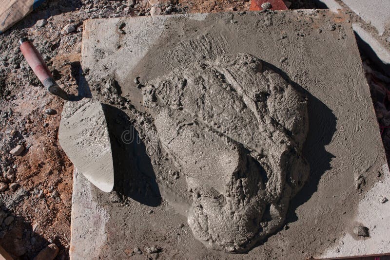Trowel and Mortar Sit Ready To Use at Construction Site Stock Image
