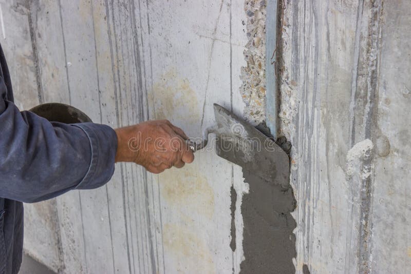 Trowel Spreading Mortar on Concrete Wall 2 Stock Photo Image of