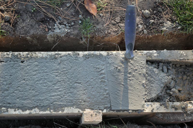 Trowel at Wall Foundation, Concrete in Formwork and Tool Stock Image Image of industrial