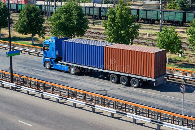 Truck with containers in seaport, cargo shipping and transportation concept royalty free stock images Truck with containers in seaport, cargo shipping and transportation concept royalty free stock images