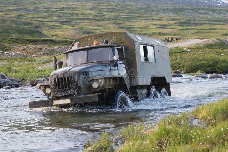 Truck crossing a river