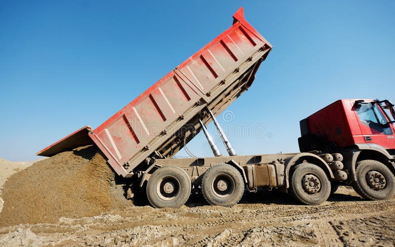 Truck unloading sand stock photo. Image of unloading 56254858