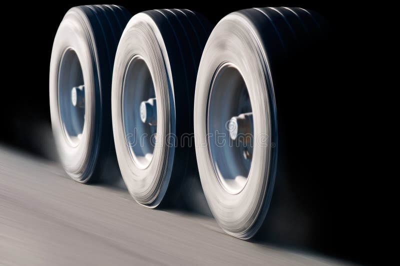 Truck wheels in motion stock photos Truck wheels in motion stock photos