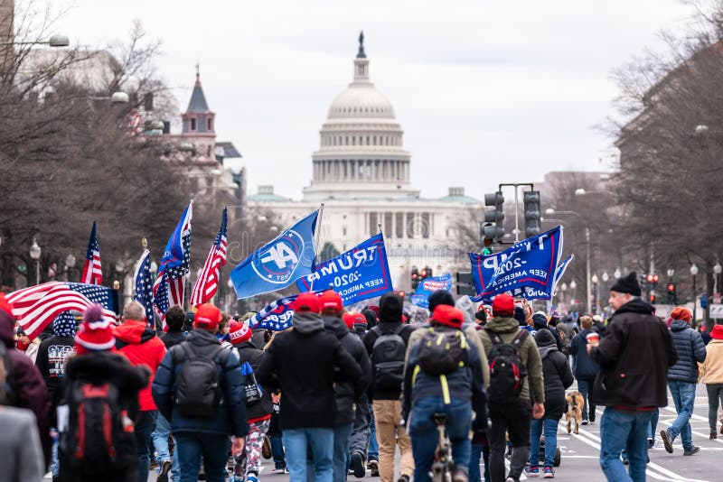 Trump Supporters were marching to the Capitol Hill on January 6th in 2021 in Washington DC USA. Trump Supporters were marching to the Capitol Hill on January 6th in 2021 in Washington DC USA.